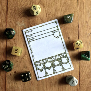 5E Ranger Character Sheet Booklet printed out and surrounded with dice