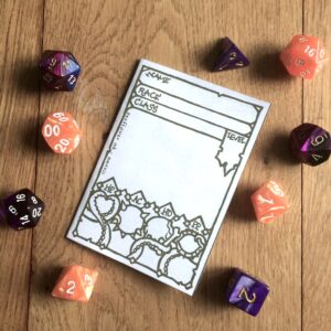 Warlock 5e Character Sheet Booklet surrounded by dice