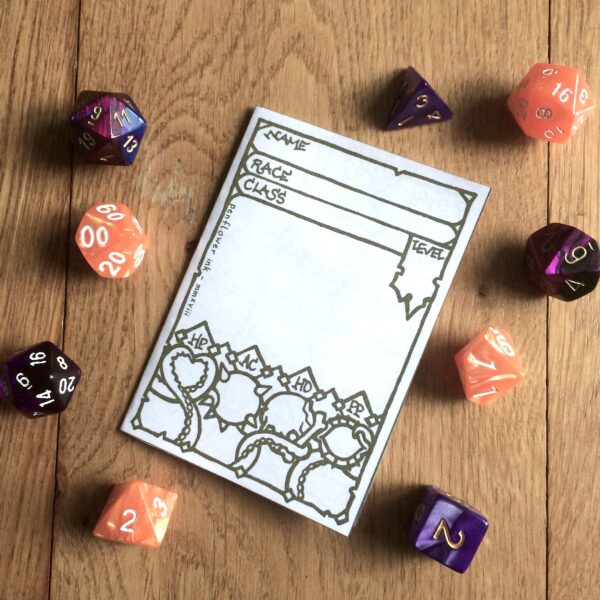 Warlock 5e Character Sheet Booklet surrounded by dice