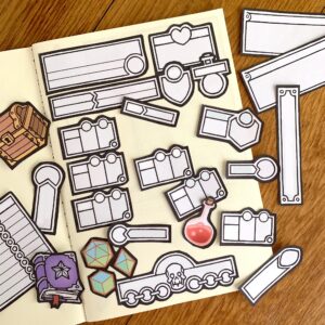 printable modular character sheet assets, arranged on a blank notebook.