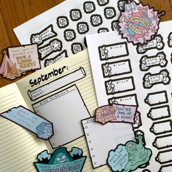 RPG-Themed Monthly Planner bits displayed on a lined notebook