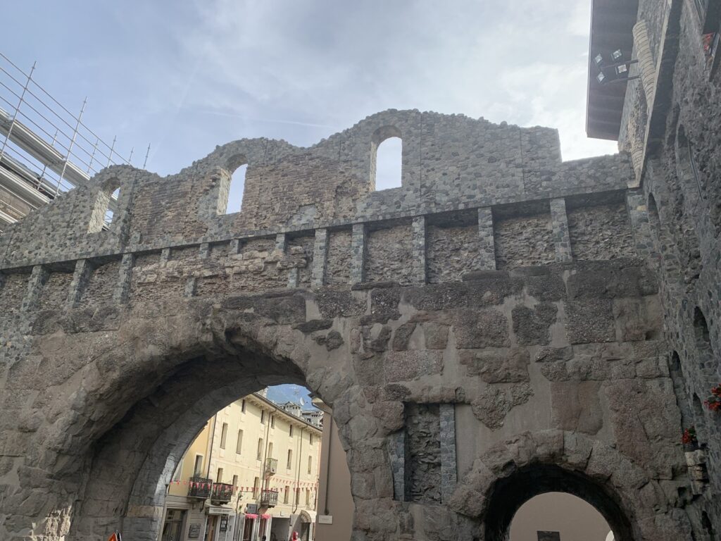 Stone archway, part of the ancient Roman town walls.